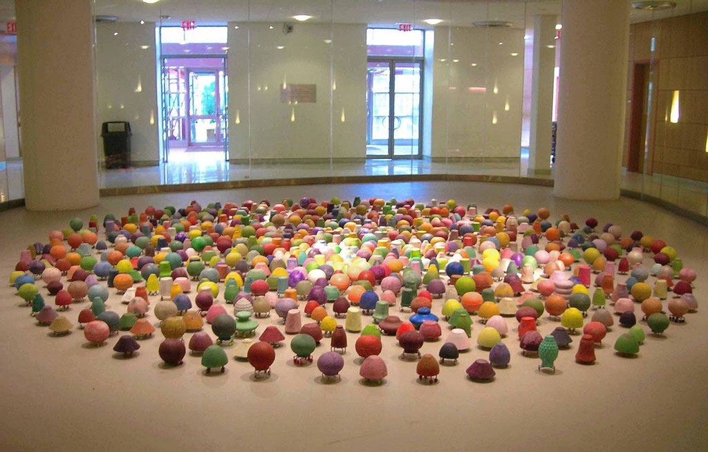Photograph of Don Porcaro's The World Is Full, showing how the artist collaborated in spirit with architect Paul Broches by filling the entire gallery floor with colorful and diverse sculptures