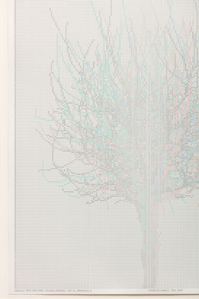 An detailed view of a work from the Walnut Tree Orchard series  (the work shown on the right in the previous image).  The art is an ink drawing made up of a grid of small squares.  Some of the squares are filled in with muted colors to form the outline of a tree.